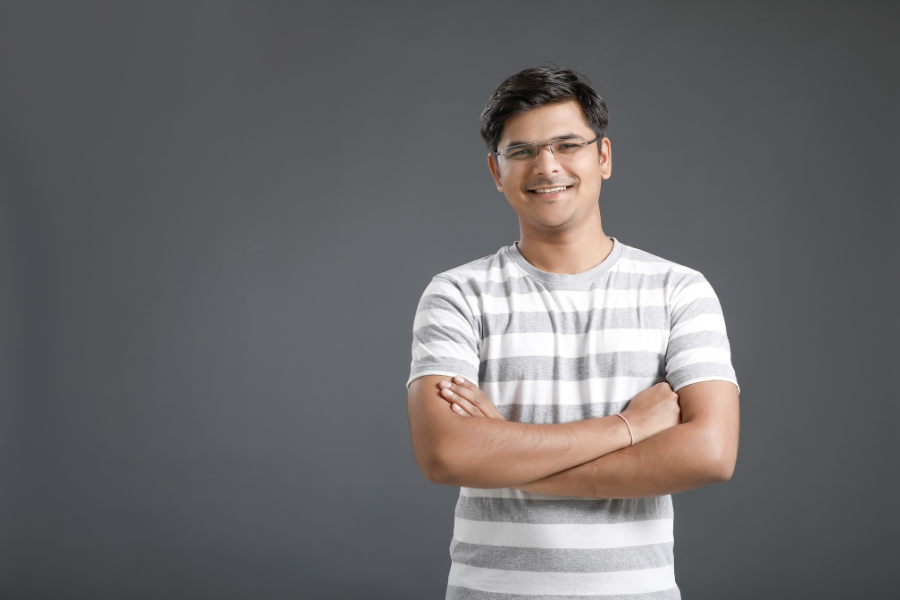 Man with Glasses in a Gray and White Stripped Shirt