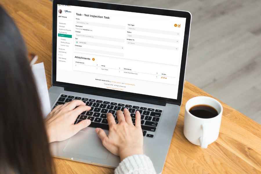 Woman on Laptop Typing with Task Details on Screen