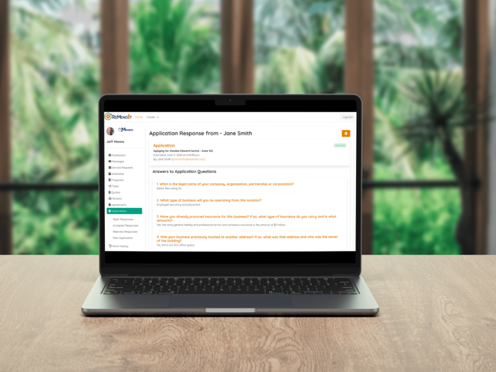 Laptop on Desk showing Application Response Details Screen