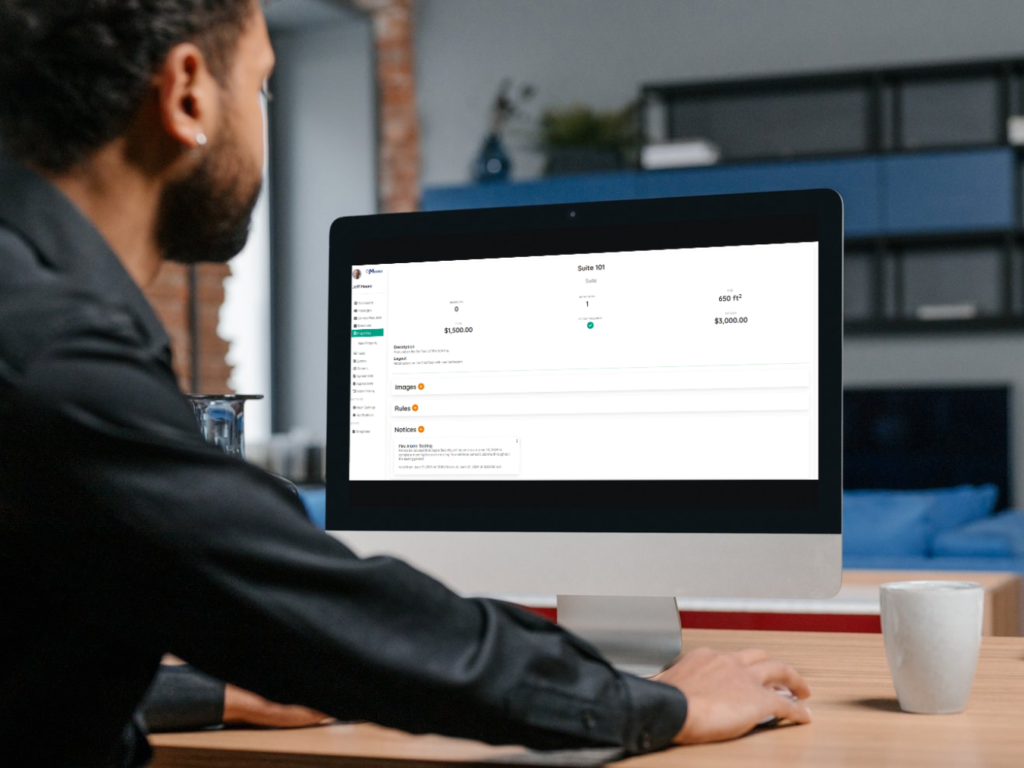 Man on Desktop showing Space Details Screen with Notices